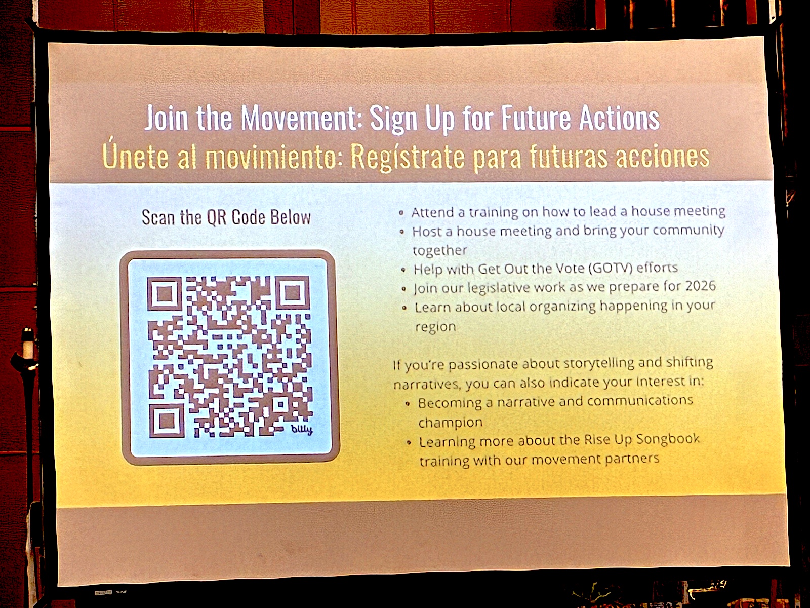 A projected slide with bullet points about future action items. It includes a QR code.