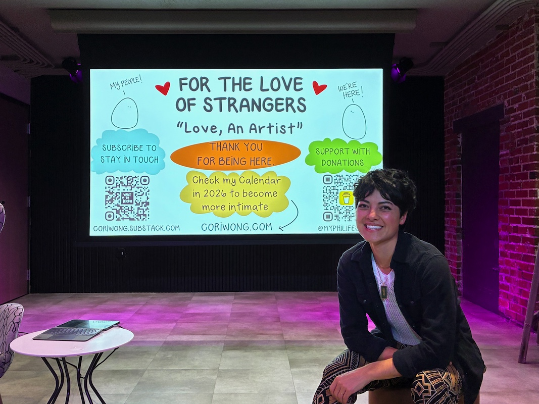 Cori sits aside with one of her playfully colorful presentation slides behind her.